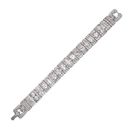 Diamond strap bracelet with round brilliant and rectangular cut stones by Cartier,